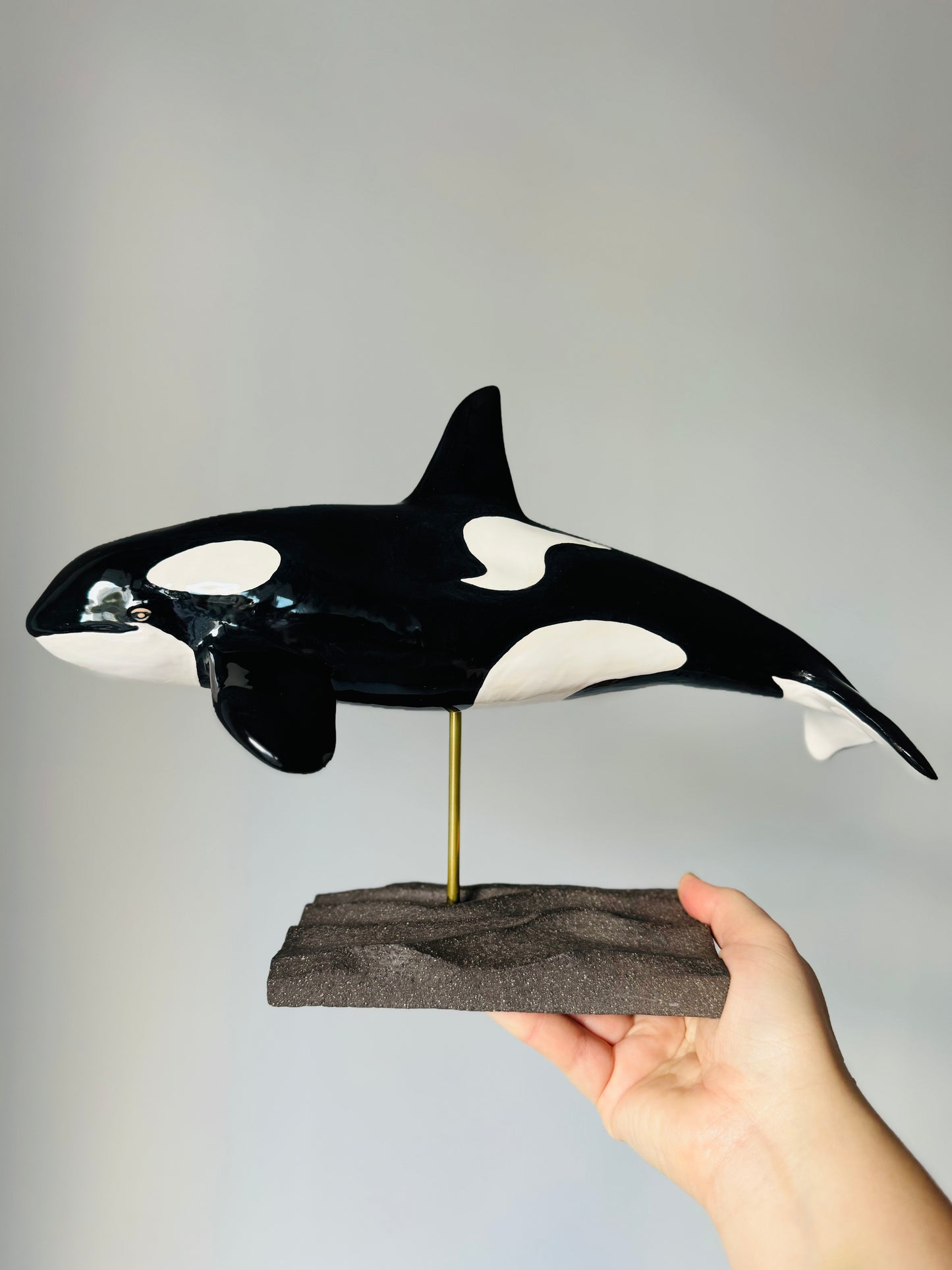 Orca on a stand