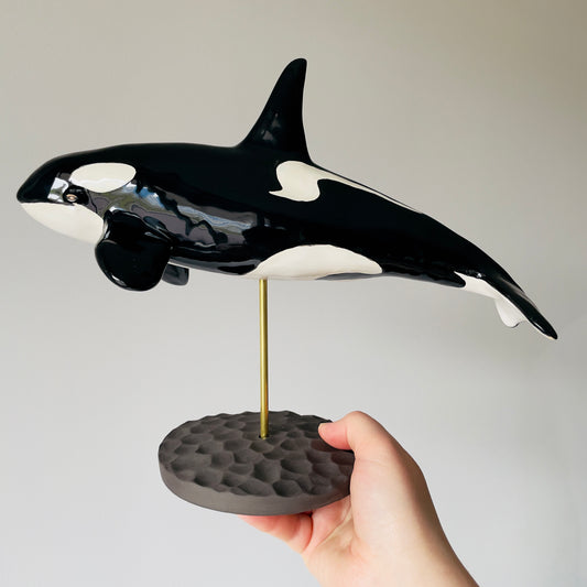 Orca on a stand