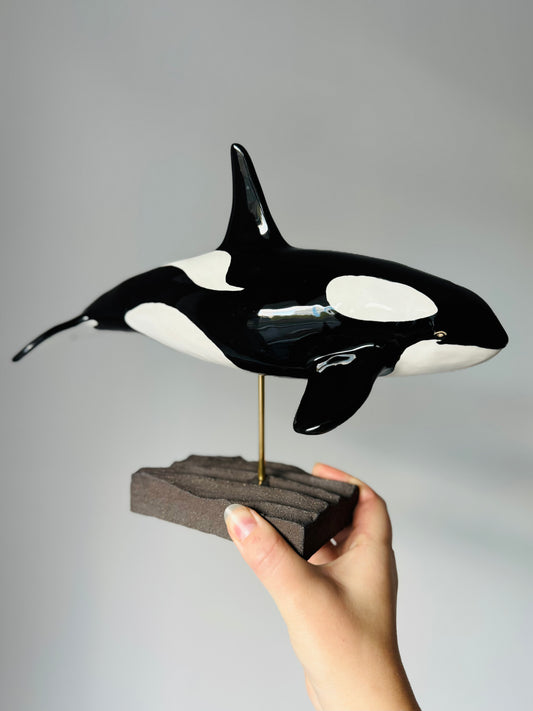 Orca on a stand