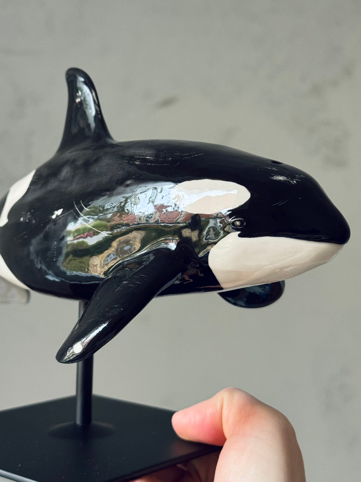 Orca on a stand