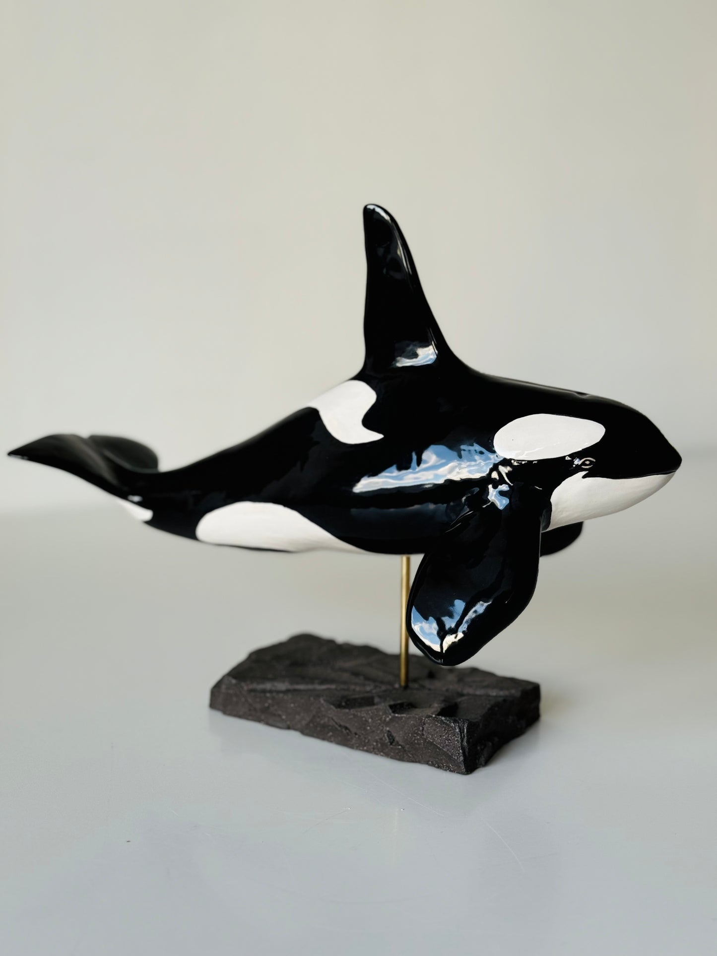 Male Orca on a stand