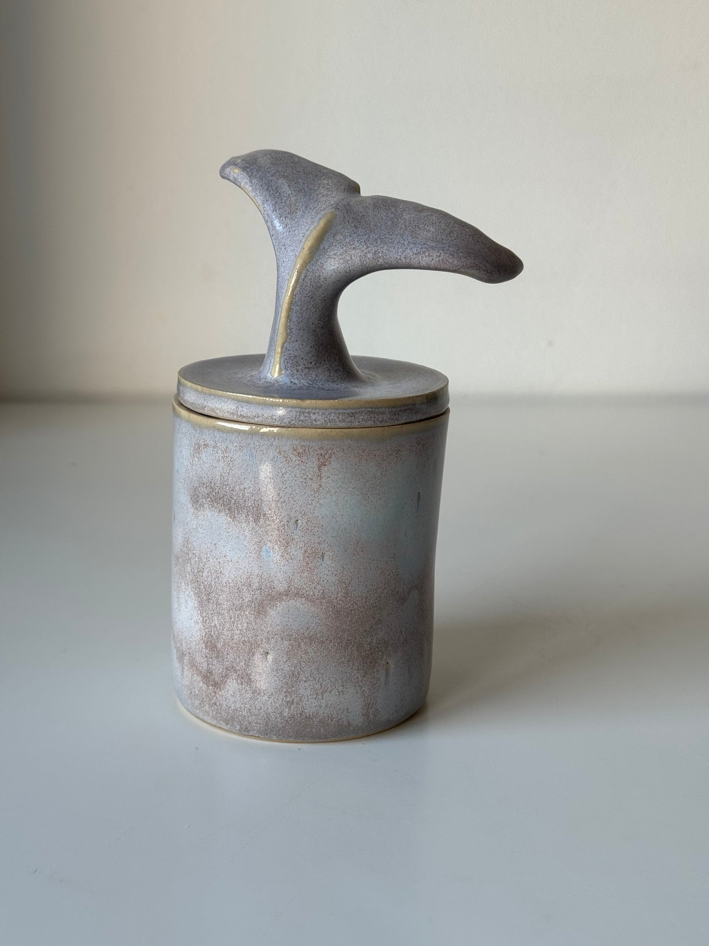 Ceramic jar with candle