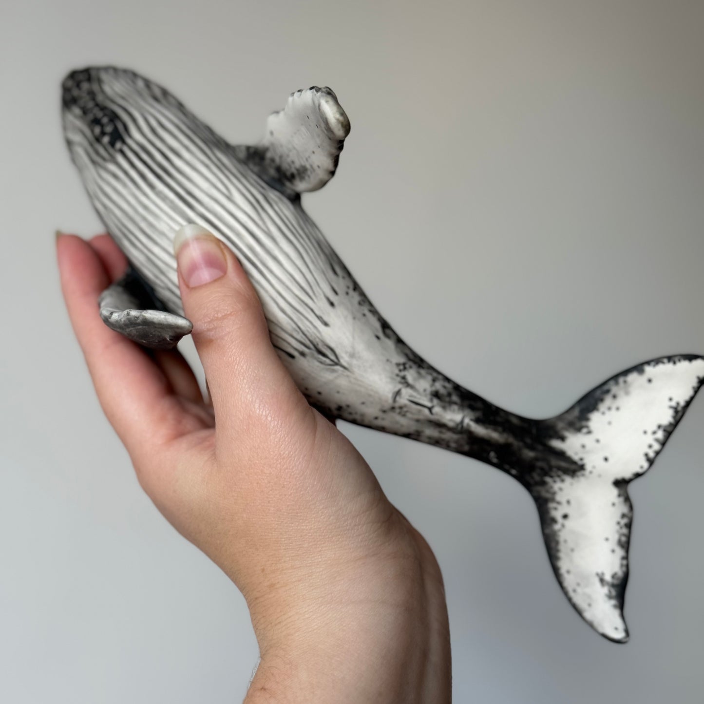 Porcelain Humpback Whale on a stand