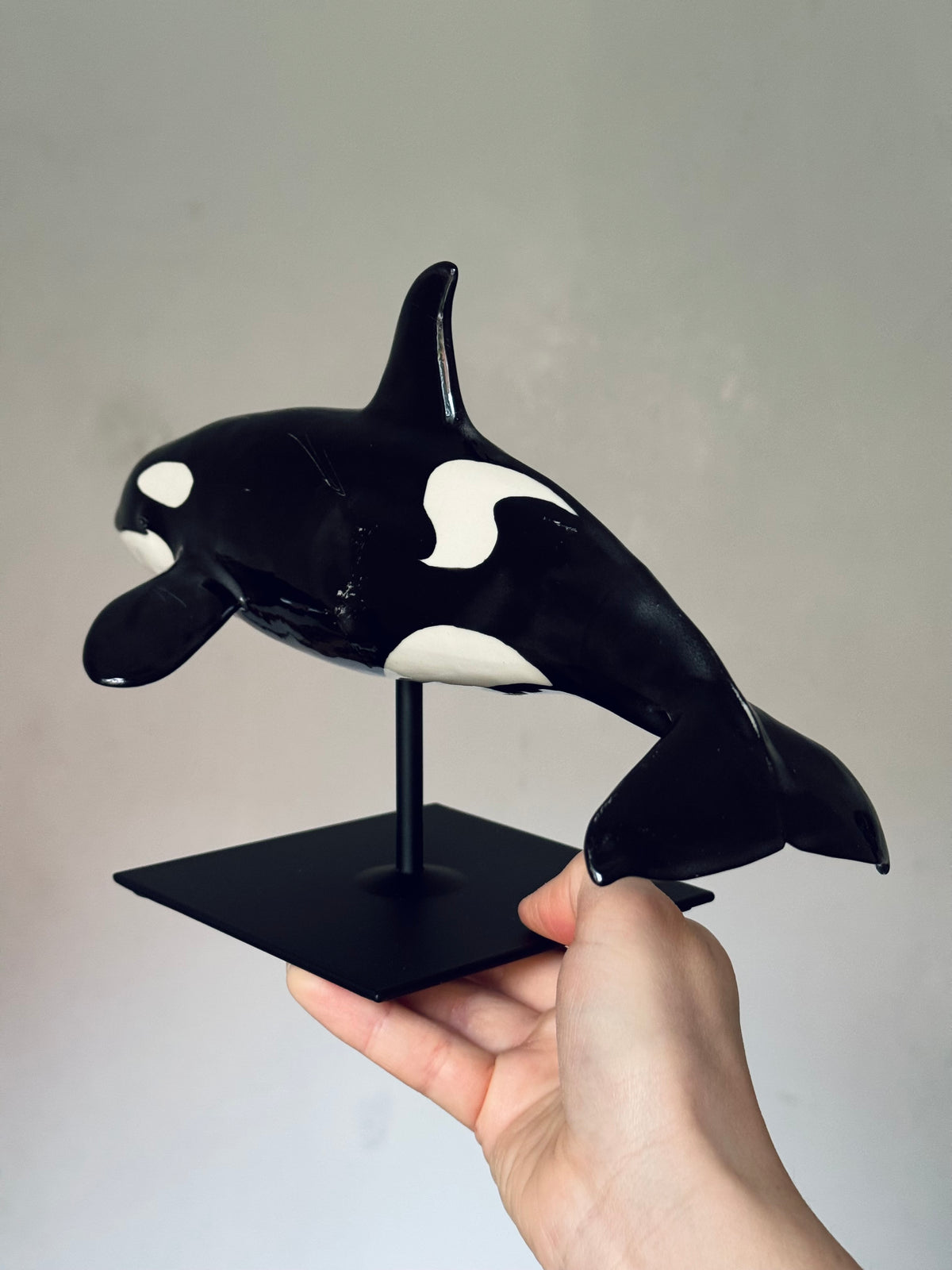 Orca on a stand