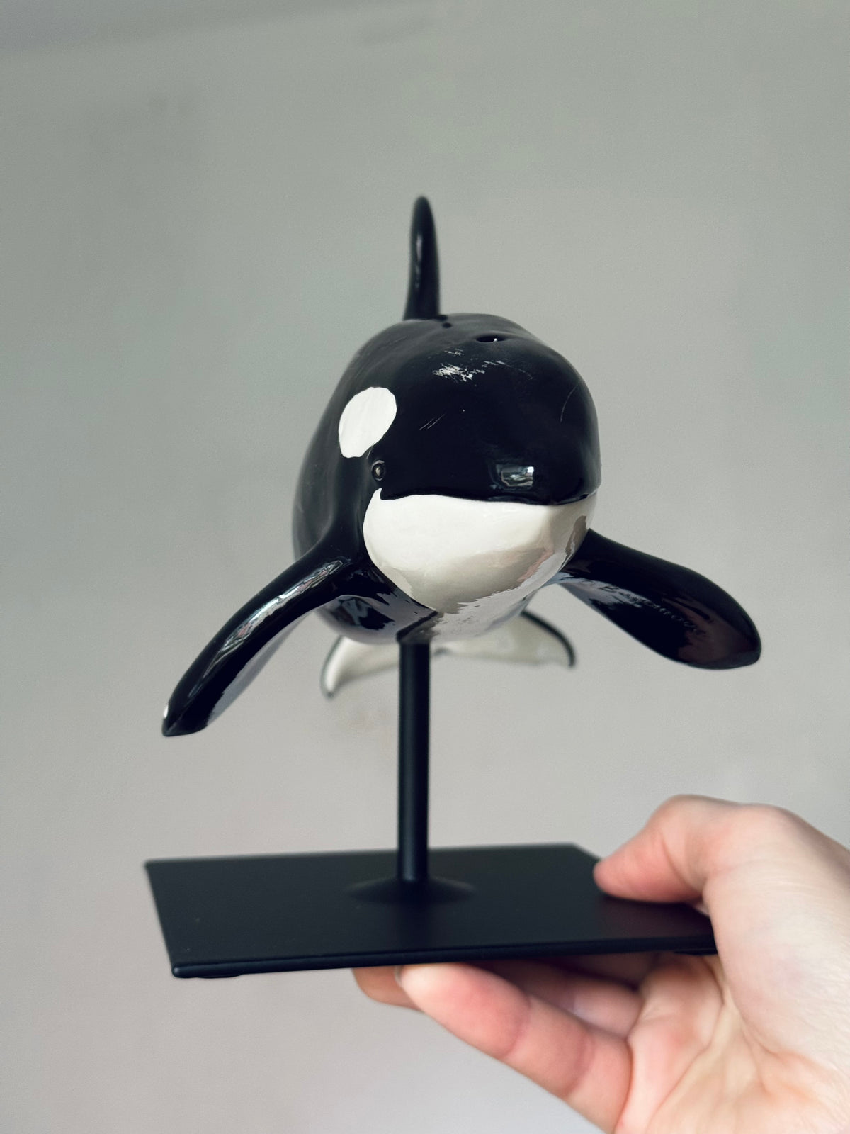 Orca on a stand
