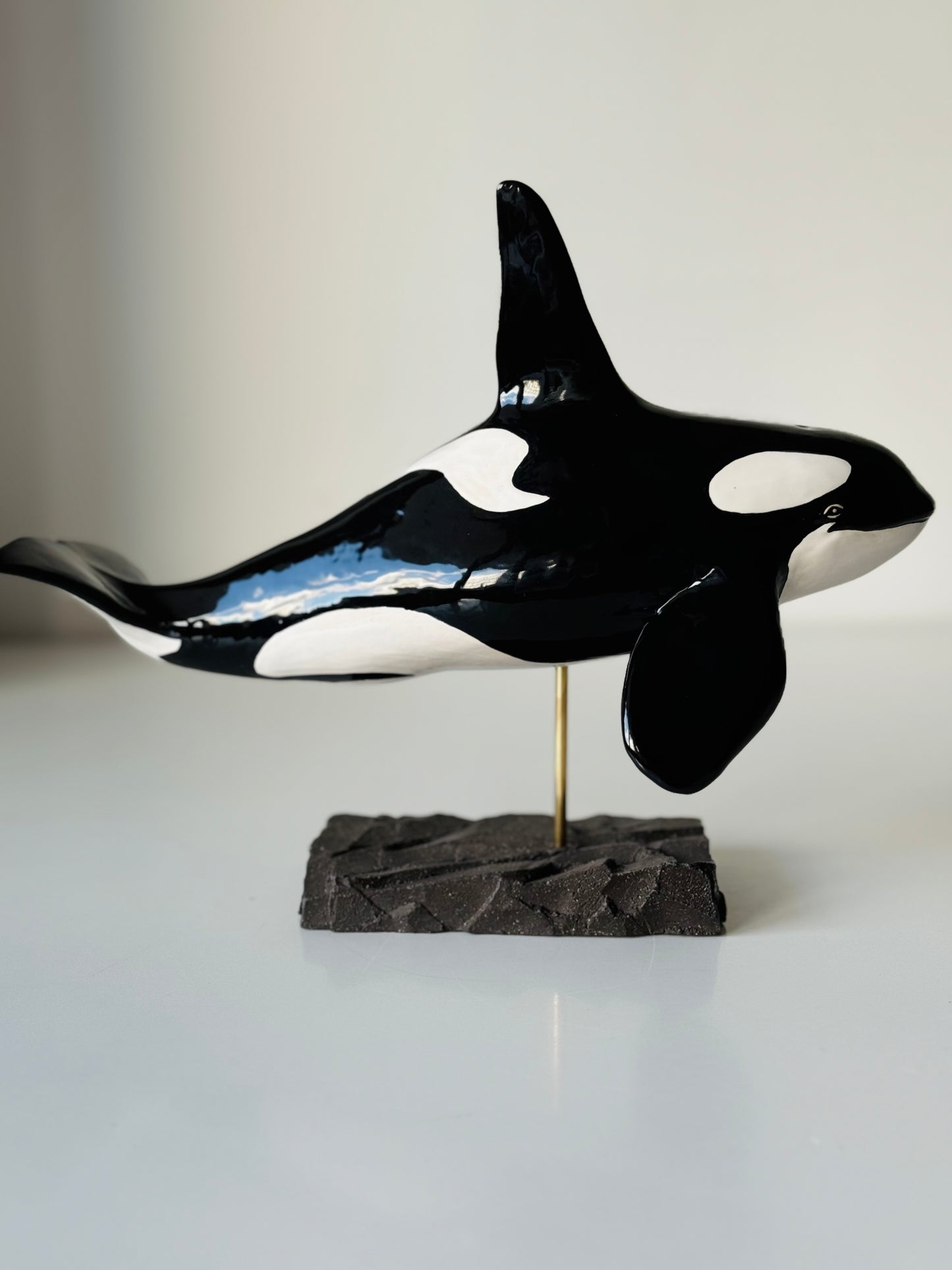 Male Orca on a stand