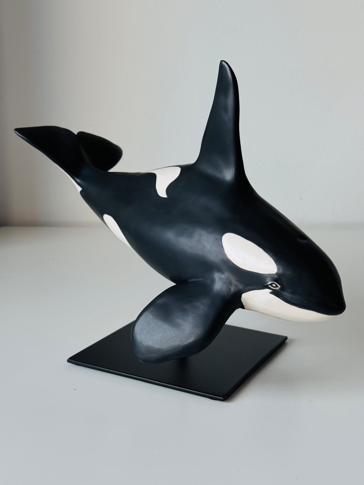 Male Orca on a stand