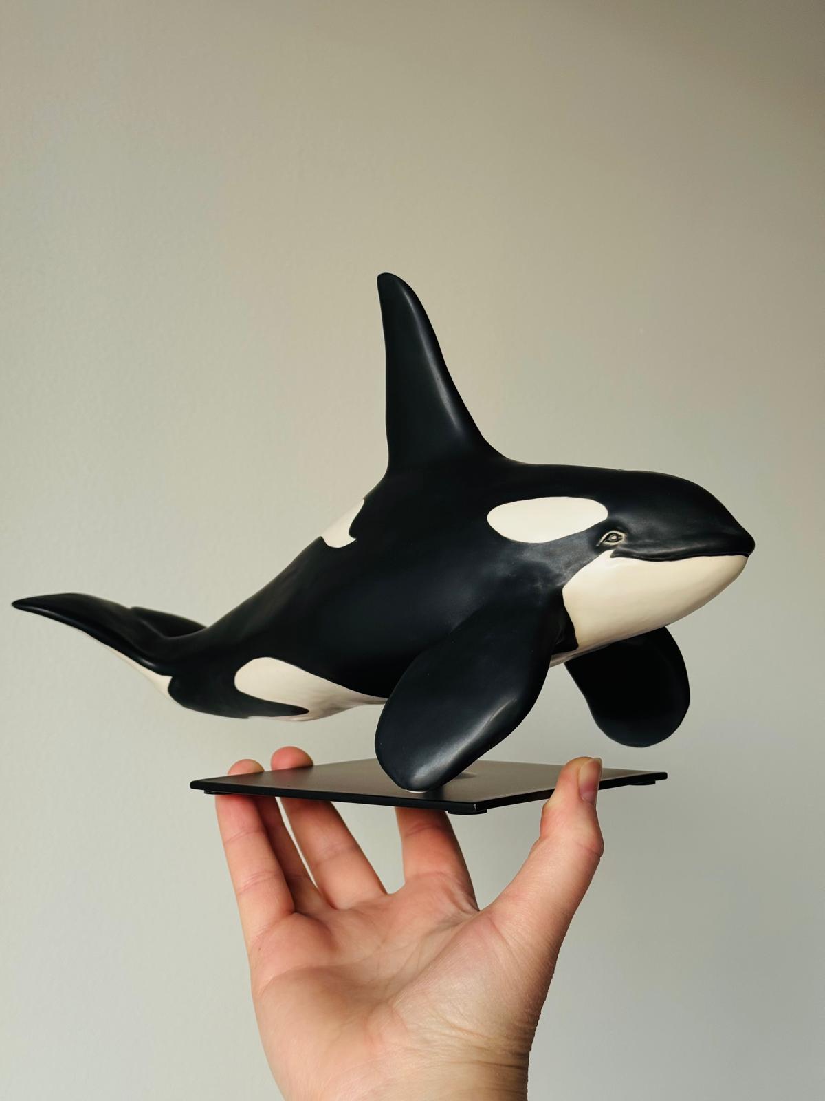 Male Orca on a stand